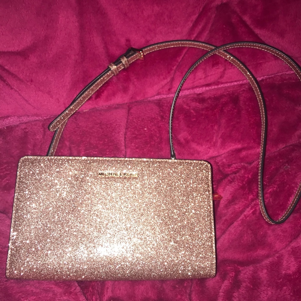 Michael Kors Rose Gold leather crossover hand bag